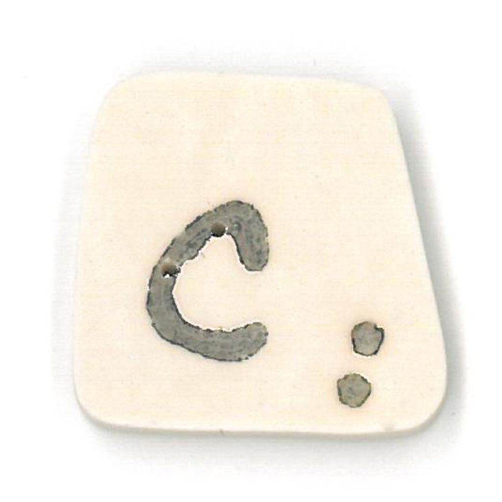 tea-dyed letter c
