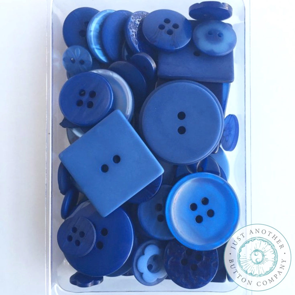 Small blue rhinestone buttons