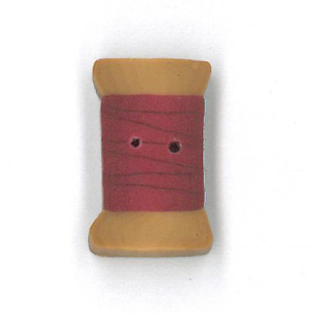 small cherry red spool