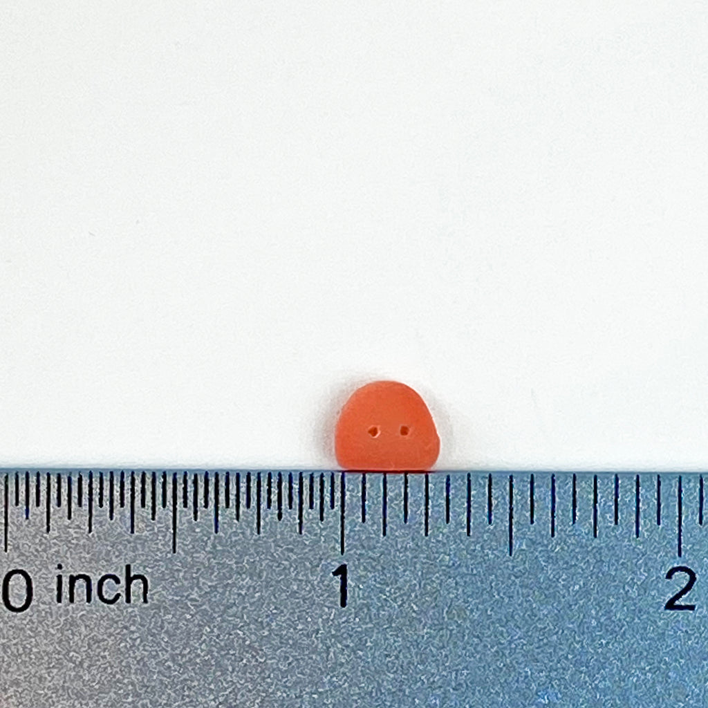 tiny orange gumdrop